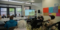 Visuel décoratif représentant une réunion de concertation des conseils de quartier.