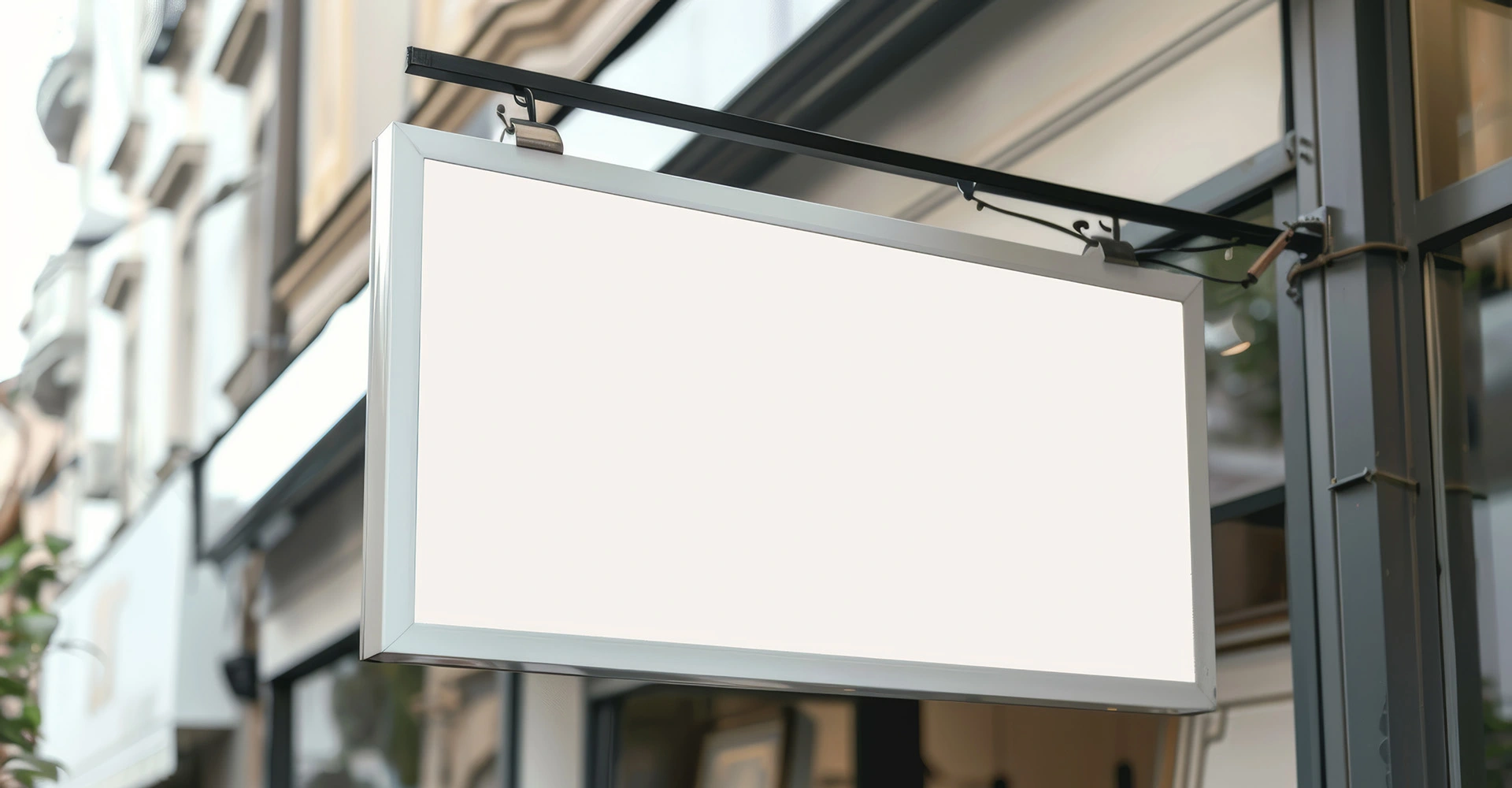Visuel décoratif représentant une enseigne extérieure de commerce, de couleur blanche