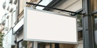 Visuel décoratif représentant une enseigne extérieure de commerce, de couleur blanche